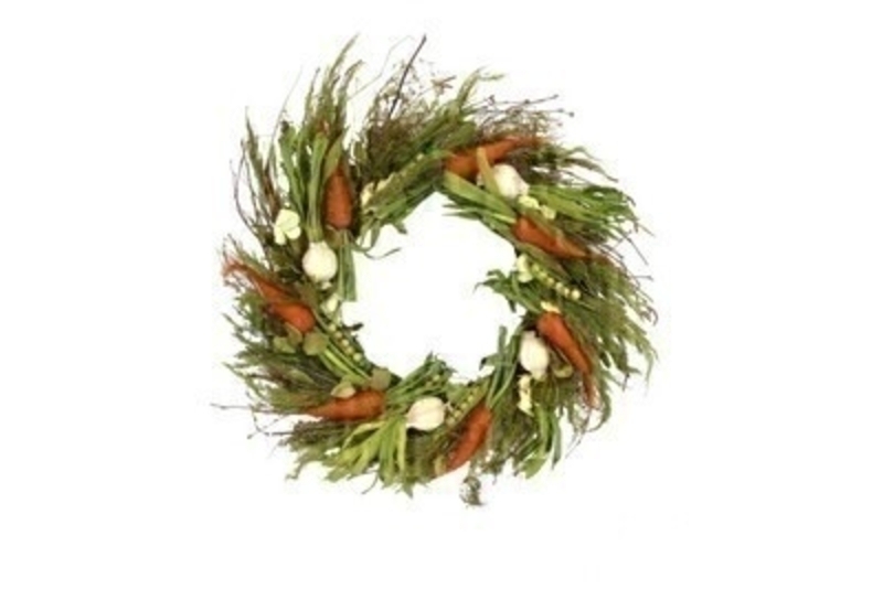 Easter green wreath with twigs and artifical vegetables including peas carrots onions.  This wreath design comes from designer Gisela Graham who makes unique Easter gifts.  Would make a lovely Easter gift.